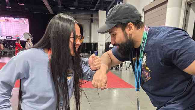 This viral fighting game makes you bark into your microphone to win