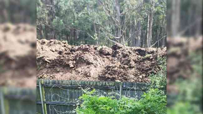 Woman claims neighbor surrounded home with poo-filled walls after land dispute