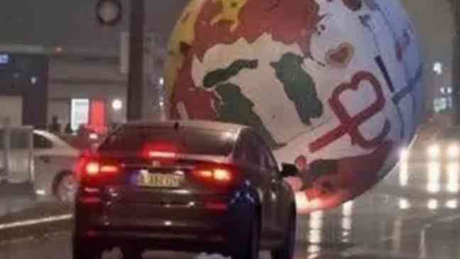 Giant runaway World Cup ball turns streets into real-life Rocket League